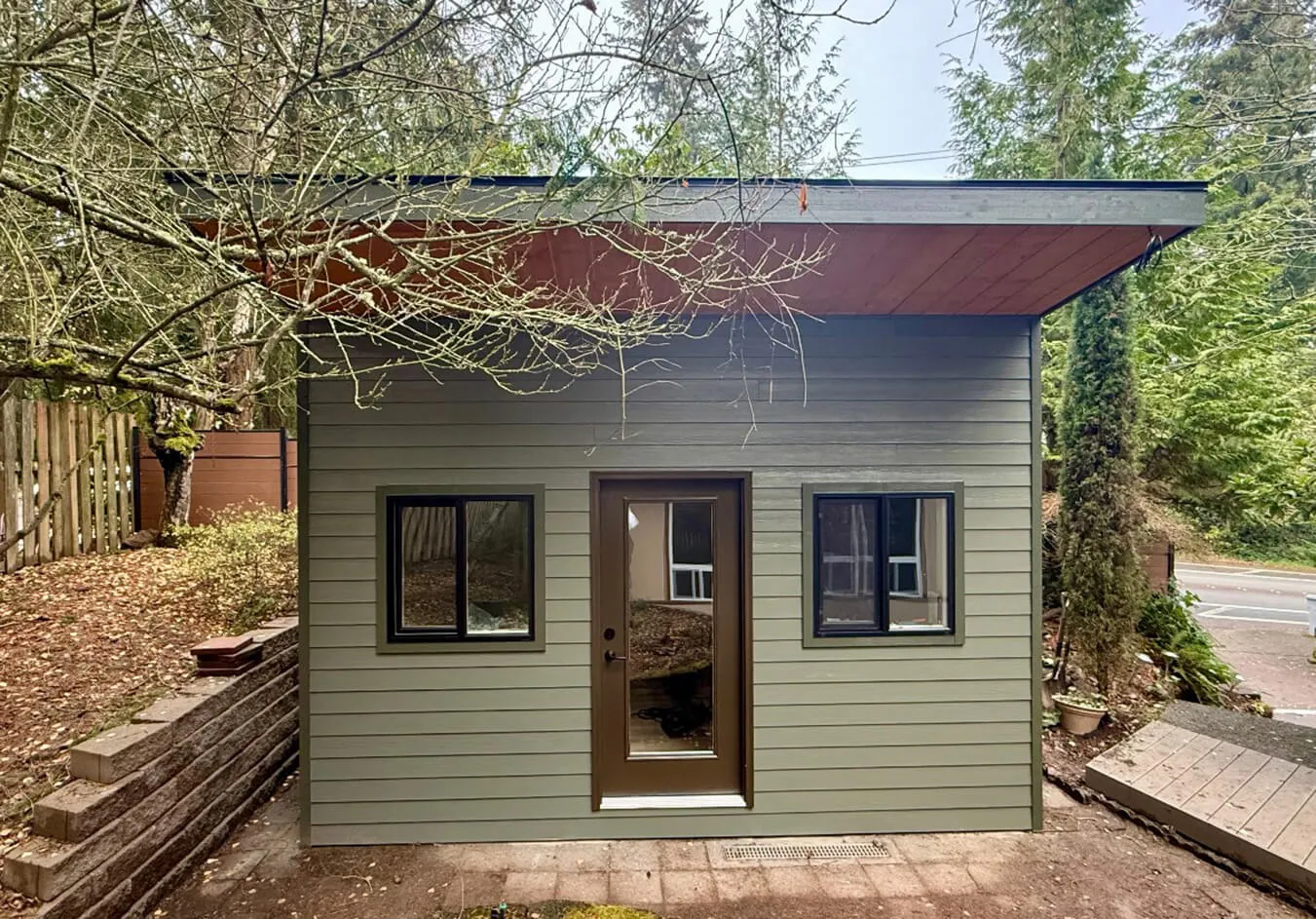 Modern backyard ADU built in Seattle with shed roof and fiber-cement siding